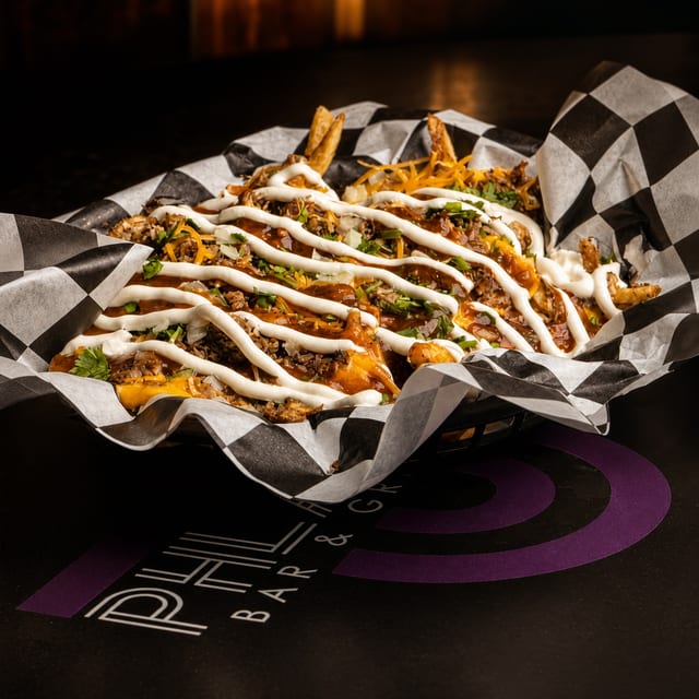 Loaded Jerk Chicken Fries.