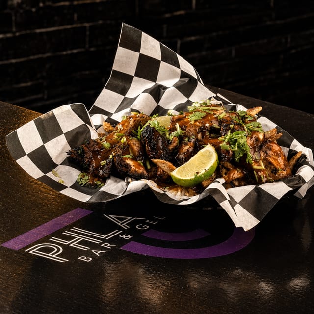 Jerk Chicken Tips w Friez.